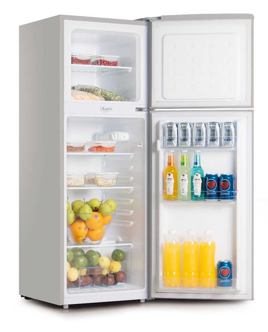 Double-door refrigerator with open freezer and fresh-food compartments, shelves and drinks