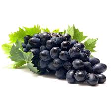Bunch of black grapes with green leaves